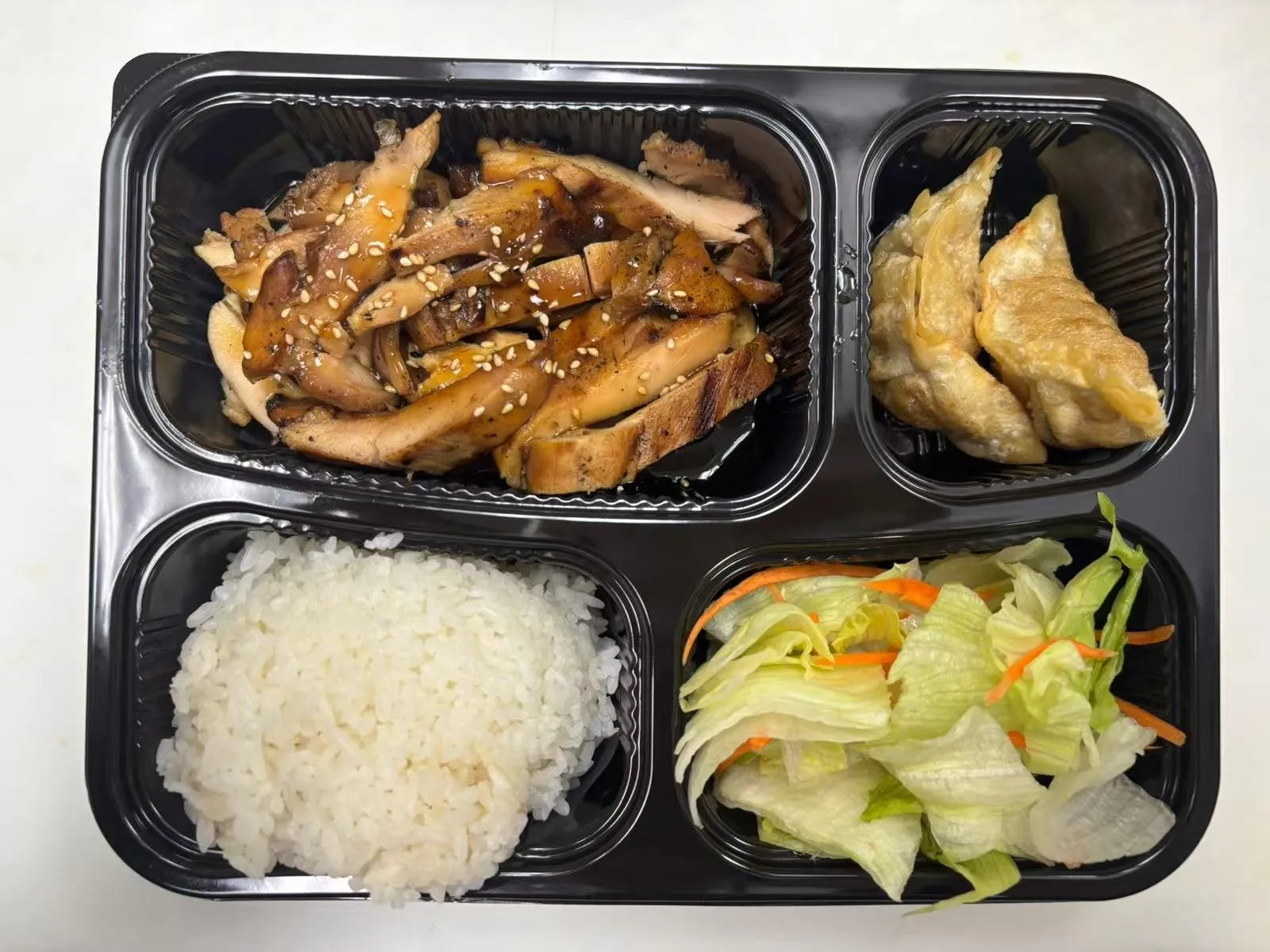 Bento box with teriyaki chicken at Zen Bento, a Asian Restaurant in Wichita