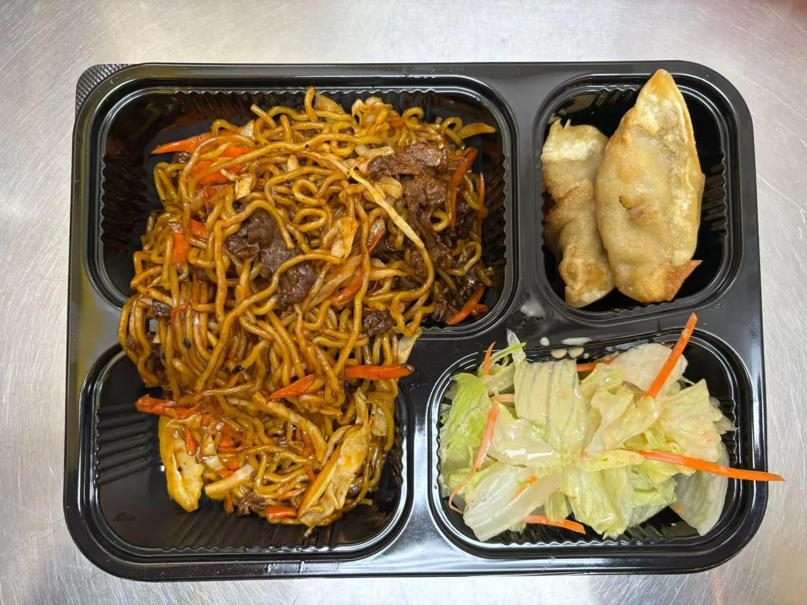 Bento box with beef chow mein at Zen Bento, a Asian Restaurant in Wichita